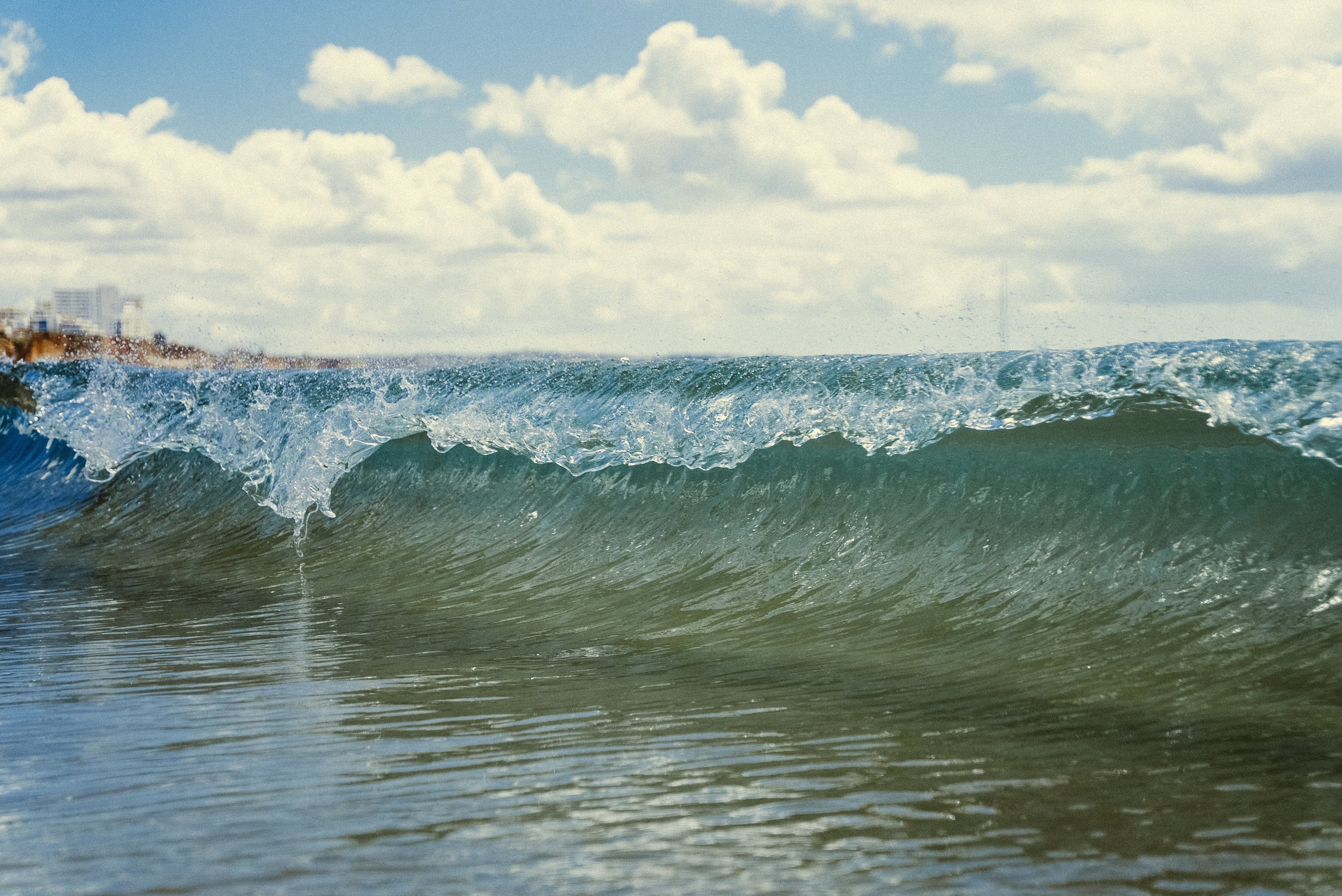 A high wave at the beach – ideal scene for RESTUBE safety buoys and water safety.