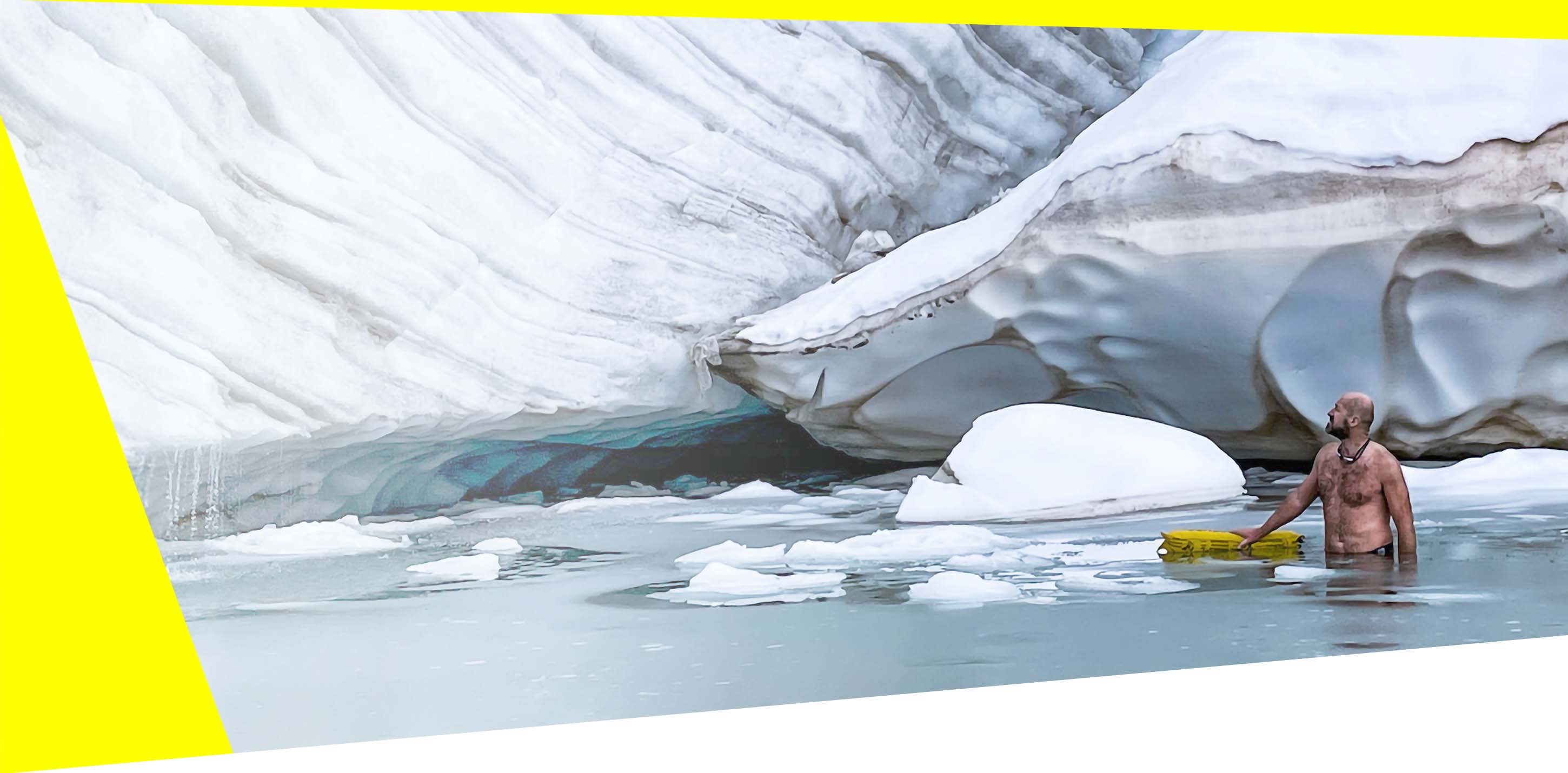 A man with RESTUBE buoy in icy water – for safety and flotation.