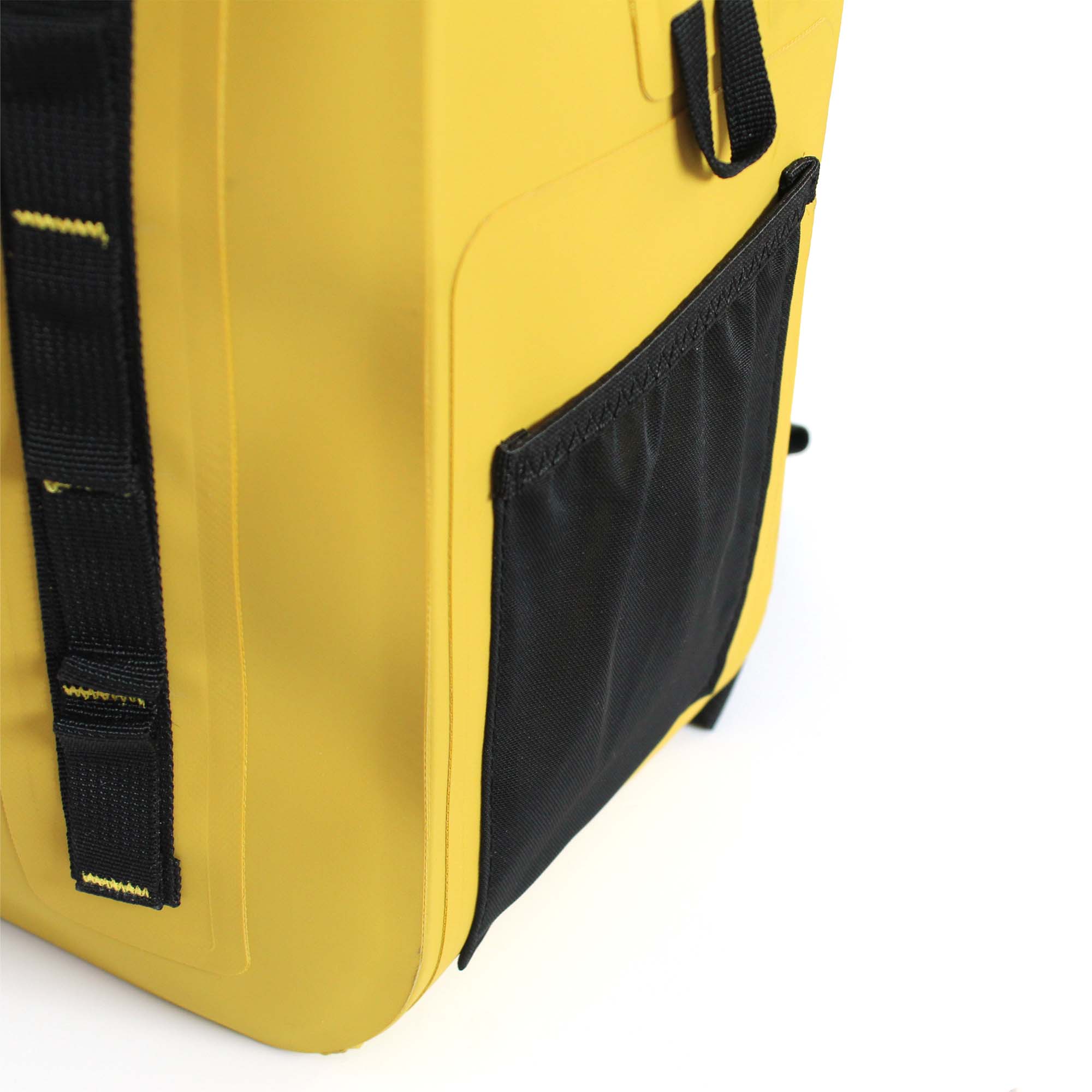 Close-up of elastic side pocket on yellow waterproof backpack for carrying a water bottle