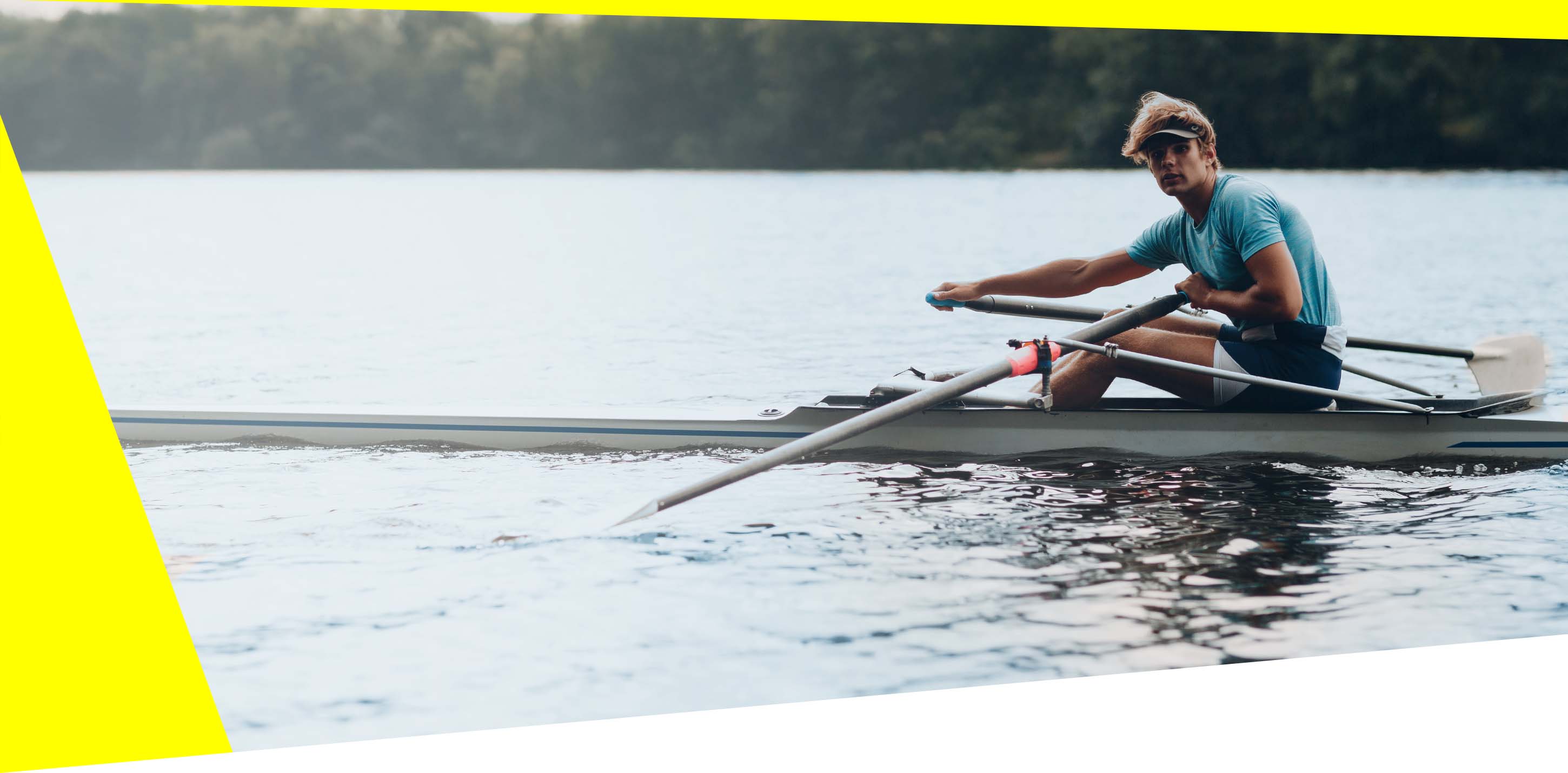 Rower with RESTUBE buoy on a lake – symbolizes safety and freedom in watersports.