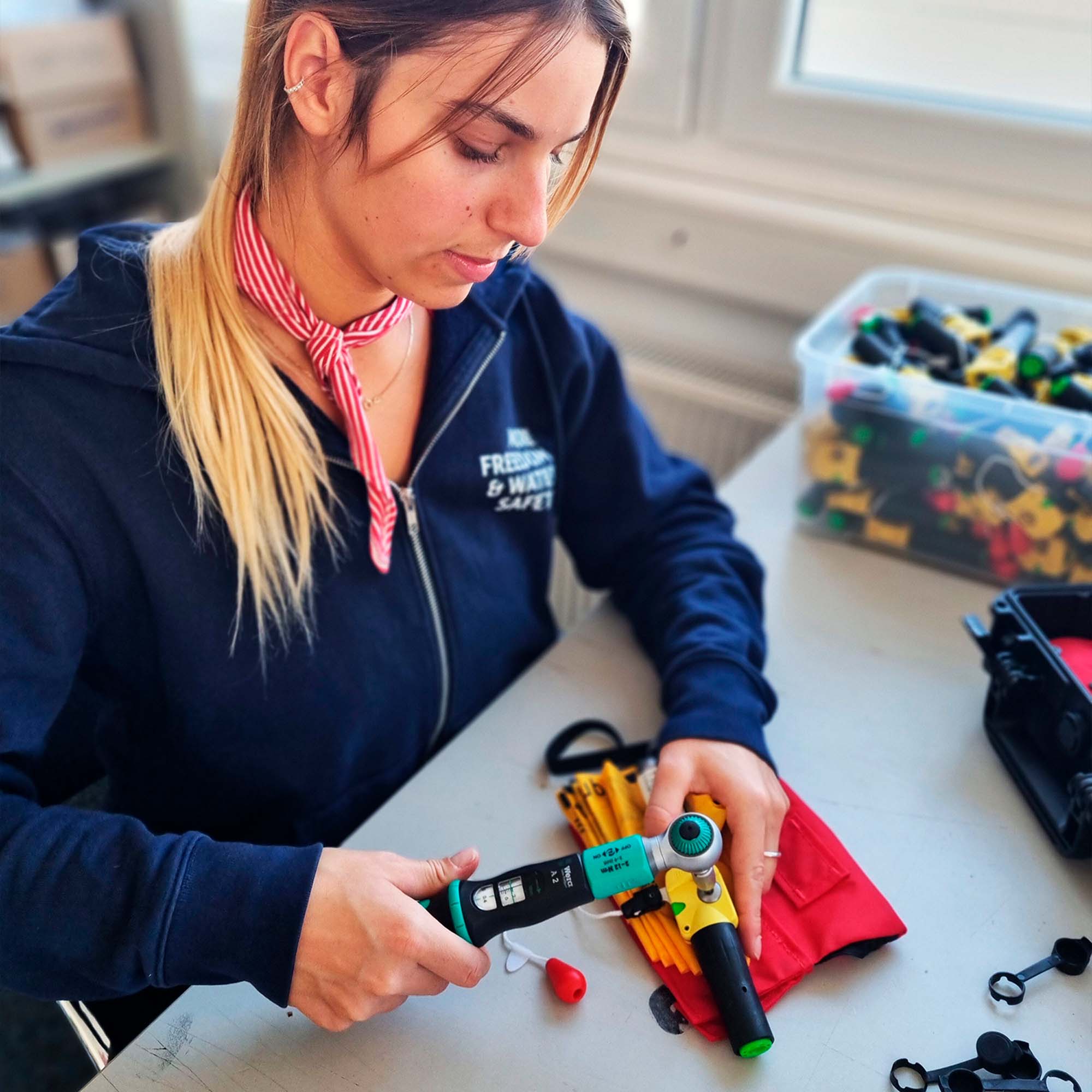 RESTUBE employee inspecting components – quality control and craftsmanship for maximum reliability.