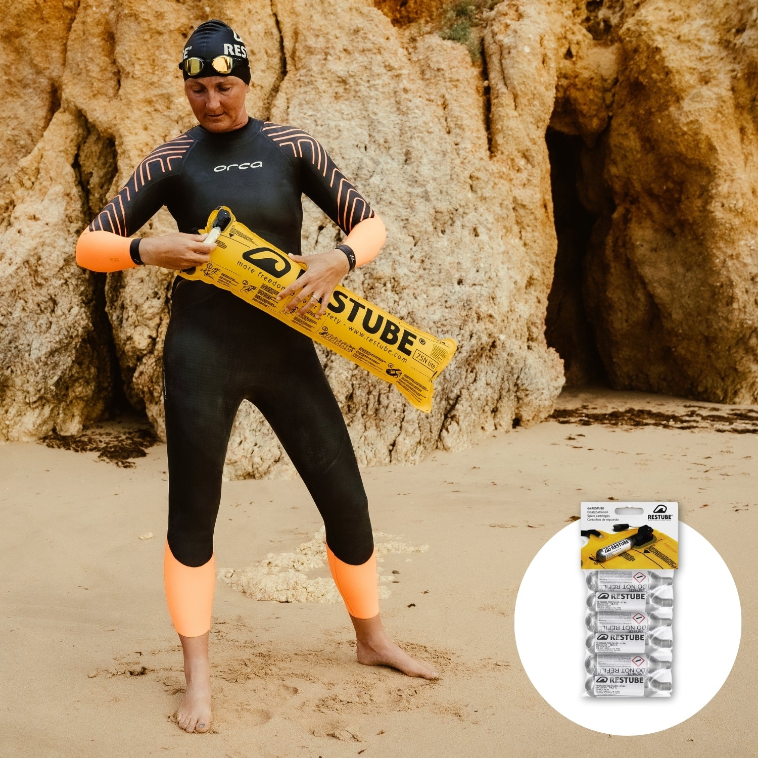 Watersports athlete with RESTUBE safety buoy on a beach, showing how to change the CO2-cartriges.