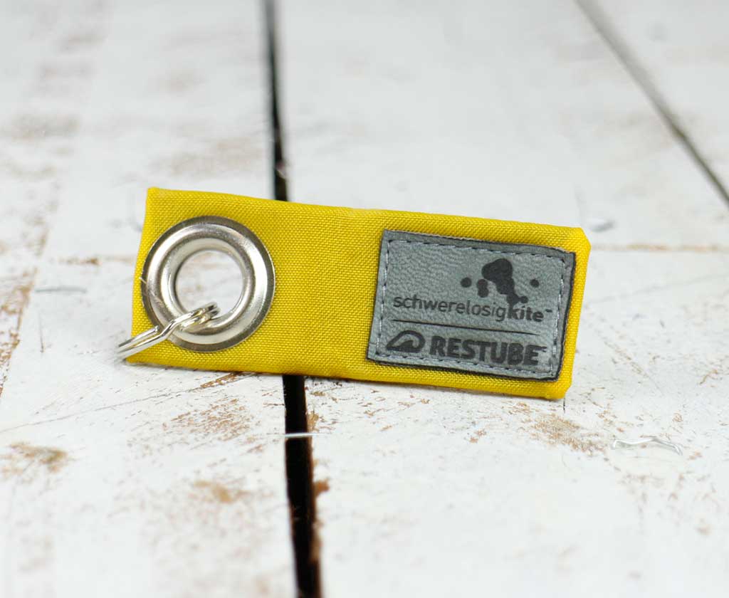 Restube und Schwerelosigkite Schlüsselanhänger aufgestellt fotografiert