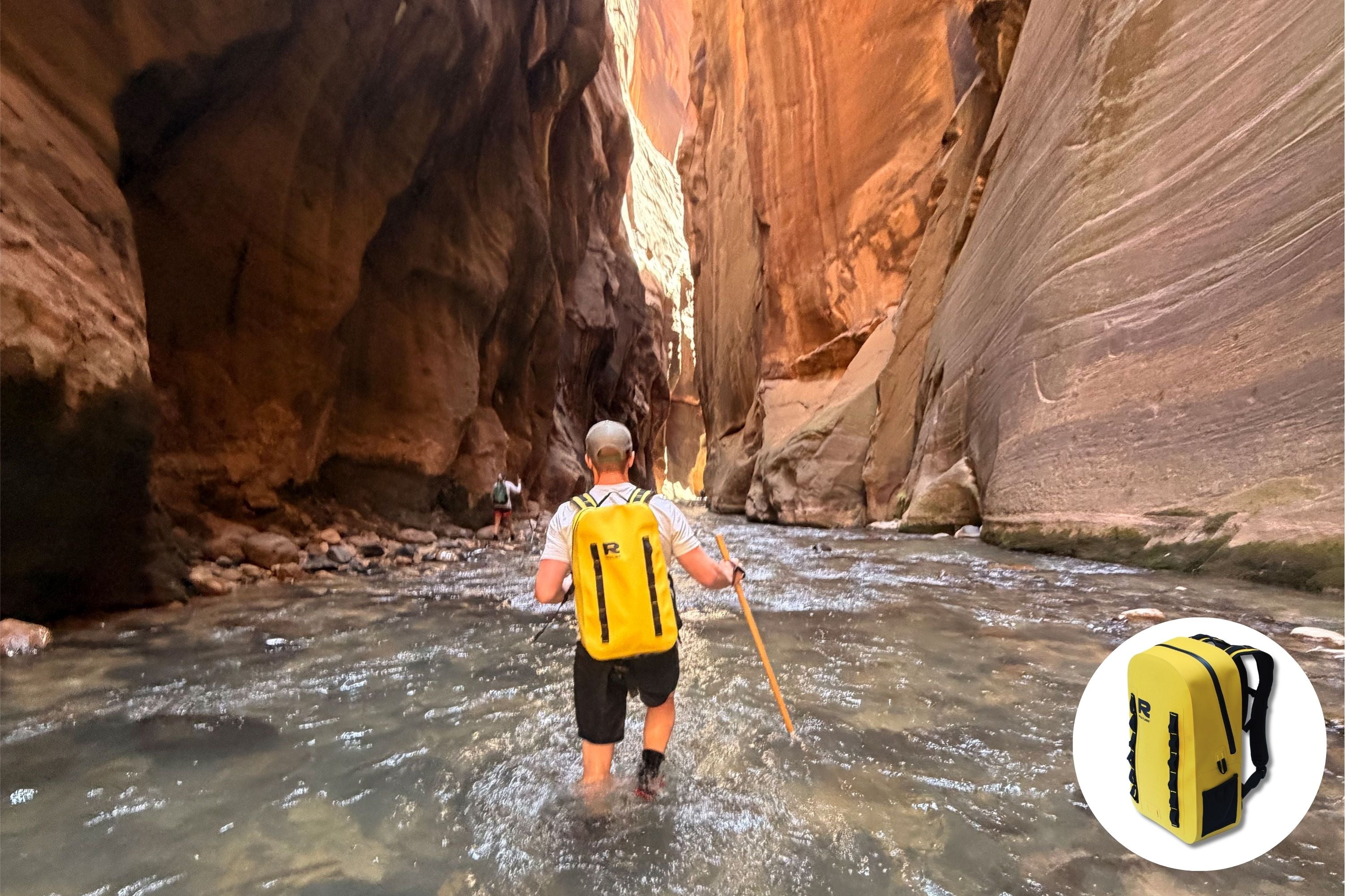 Man crossing a river in a canyon with the yellow RESTUBE OCEAN waterproof backpack, product inset shown bottom right