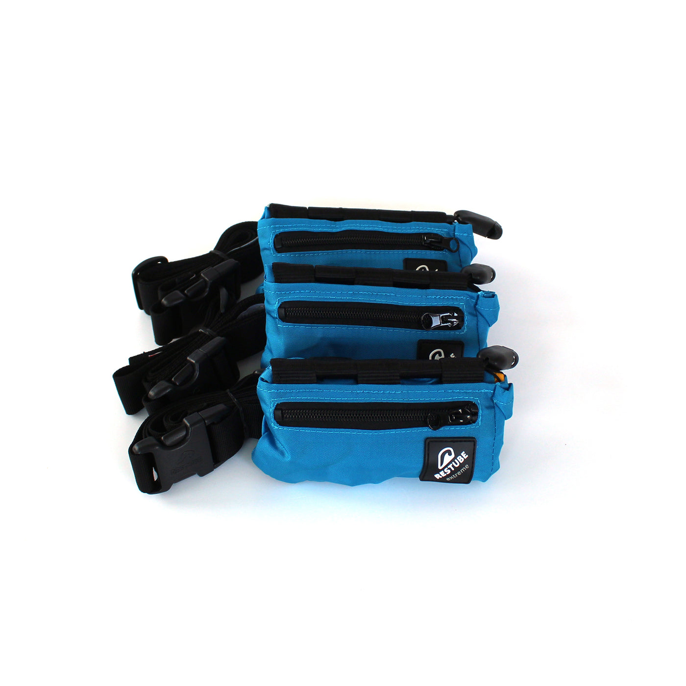 Drei Restube extreme in blauer Tasche verpackt, mit schwarzem Gürtel